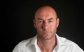 ADAM GOODRUM black background front portrait